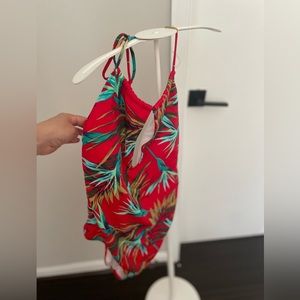 Pink Victoria’s Secret Floral one piece swimsuit.